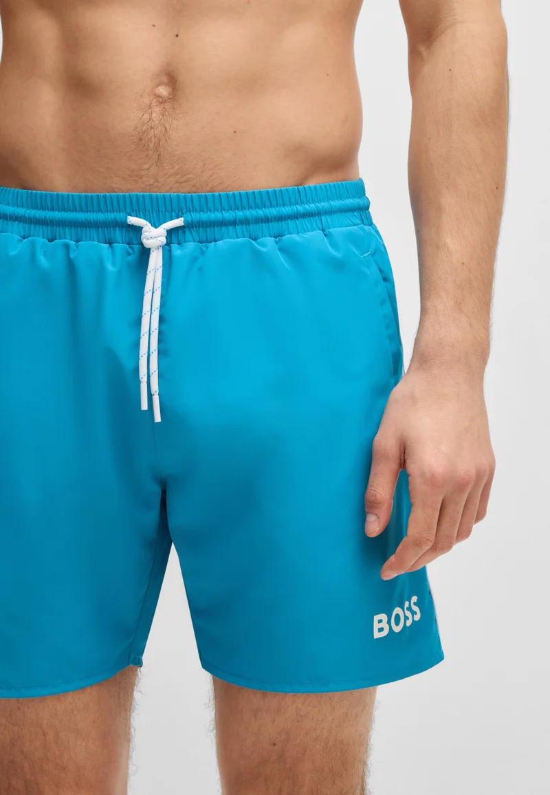 بوس شورت سباحة سريع الجفاف بتفاصيل متباينة