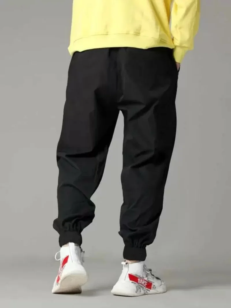 Maniac  Maniac Solid Mens Black Loose Fit Polyester Cargo Trackpant for Men | Best Price UAE