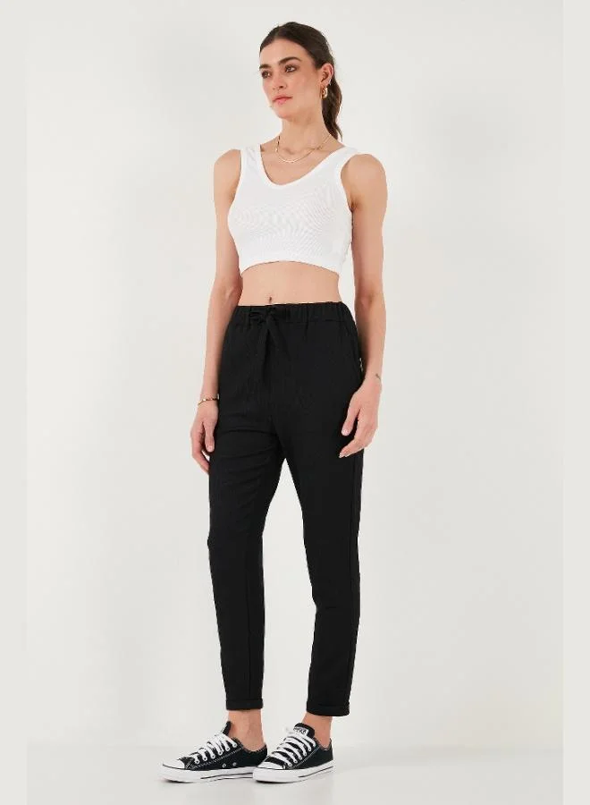 ليلا بنطلون نسائي ضيق بقصة قصيرة وخصر مربوط وجيوب