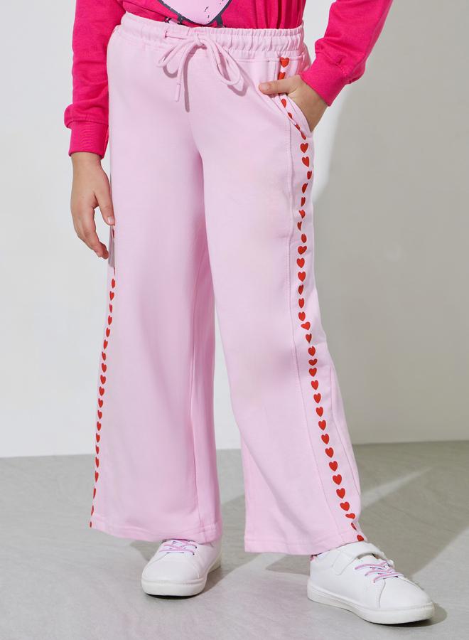 Styli Girls Pink Side heart Print Wide leg Joggers - Image 1