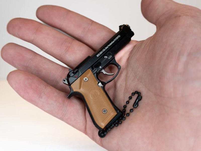 Miniature M9 Pistol Keychain Accessory - Tactical Realistic Appearance Durable Metal Construction for Firearm Enthusiasts Collectors - Image 5