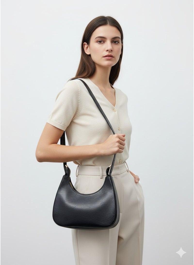 Vbranda Stylish shoulder bag with a modern design and glossy finish featuring a zip closure. - Image 1