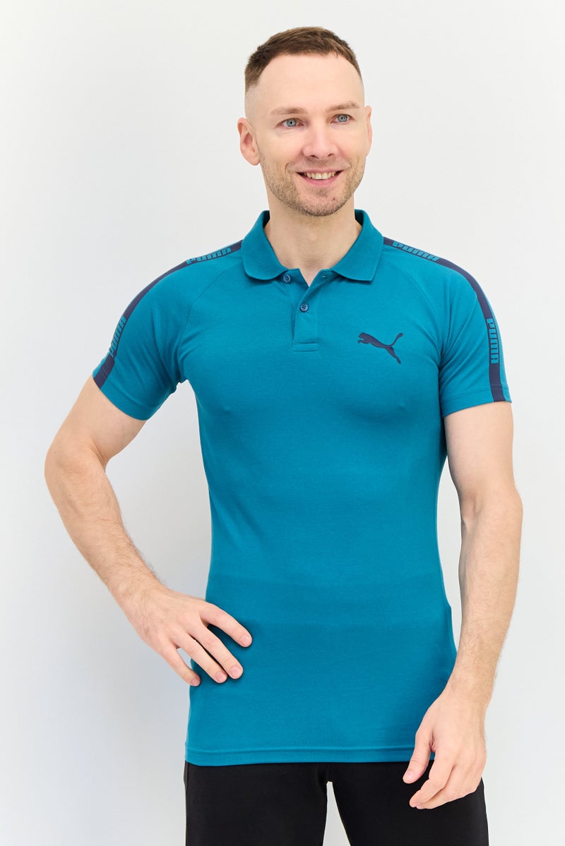PUMA Men Sportswear Fit Short Sleeve Outdoor Polo, Teal Green - Image 1