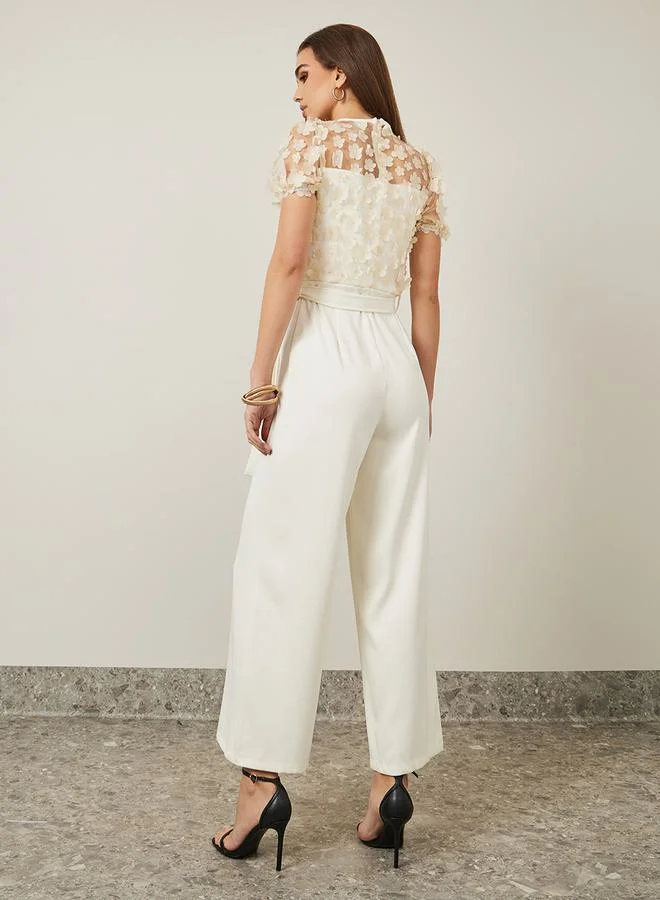 ستايلي Floral Applique Wide Leg Jumpsuit with Tie Belt