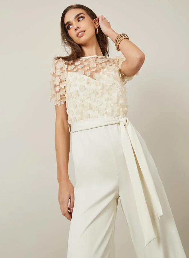 ستايلي Floral Applique Wide Leg Jumpsuit with Tie Belt