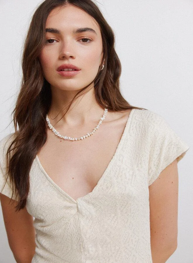 Springfield  Embroidered knot neckline dress for Women | Best Price UAE
