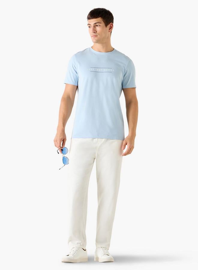 ايكونيك تيشيرت بطباعة شعار أيقوني بياقة دائرية وأكمام قصيرة - Image 2