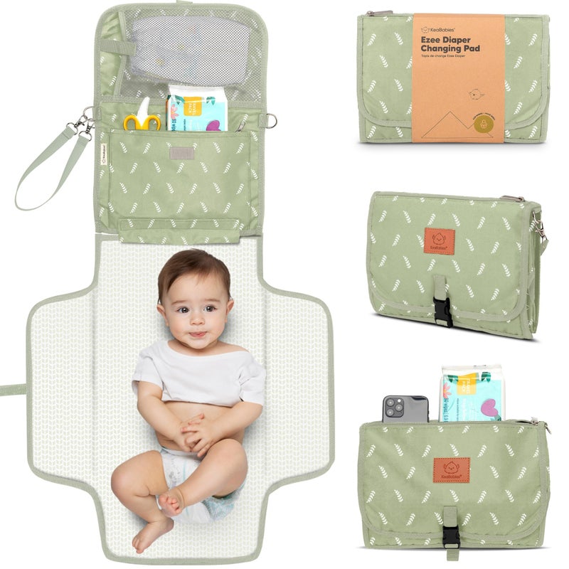 KeaBabies Portable Diaper Changing Pad - Large Waterproof Baby Changing Mat, Compact Travel Diaper Clutch, Functional Pockets Fit Newborn Essentials, Wipeable & Padded Baby Changer (Acacia) - Image 1