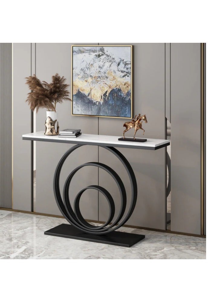 fan baytk - The Black Modern Entryway is a piece of furniture that combines elegance and practicality. With dimensions of 110 cm length x 90 cm height x 30 cm width, this entryway provides ideal storage space for everyday items, and can also be used to display flowers or decorative items, adding a distinctive aesthetic touch to any interior space. Its modern design is in harmony with high-quality materials, making it easy to maintain and ensuring that its attractive appearance is maintained. With a unique visual balance between black iron and marble wood, this entryway is a great attraction that enhances the aesthetics of your home. - Image 1
