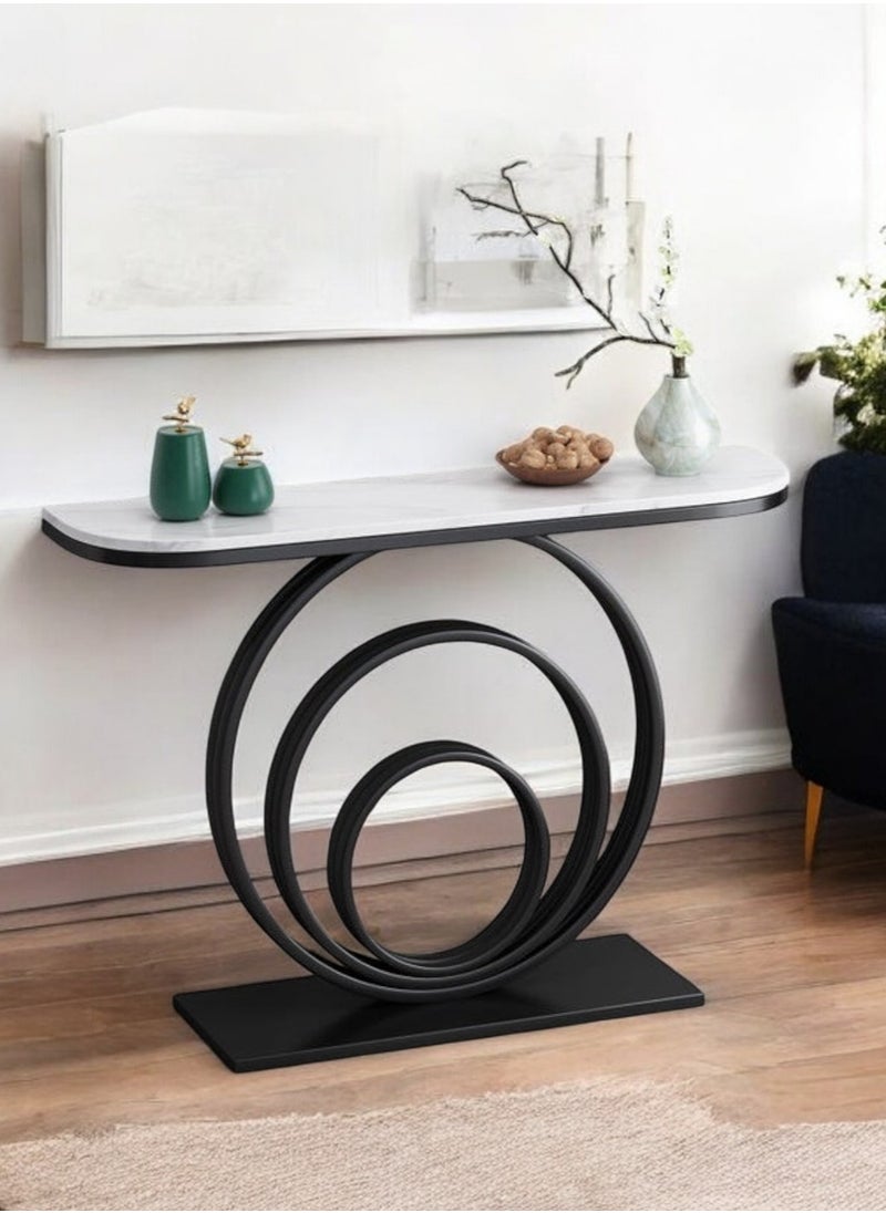 fan baytk - The Black Modern Entryway is a piece of furniture that combines elegance and practicality. With dimensions of 110 cm length x 90 cm height x 30 cm width, this entryway provides ideal storage space for everyday items, and can also be used to display flowers or decorative items, adding a distinctive aesthetic touch to any interior space. Its modern design is in harmony with high-quality materials, making it easy to maintain and ensuring that its attractive appearance is maintained. With a unique visual balance between black iron and marble wood, this entryway is a great attraction that enhances the aesthetics of your home. - Image 1
