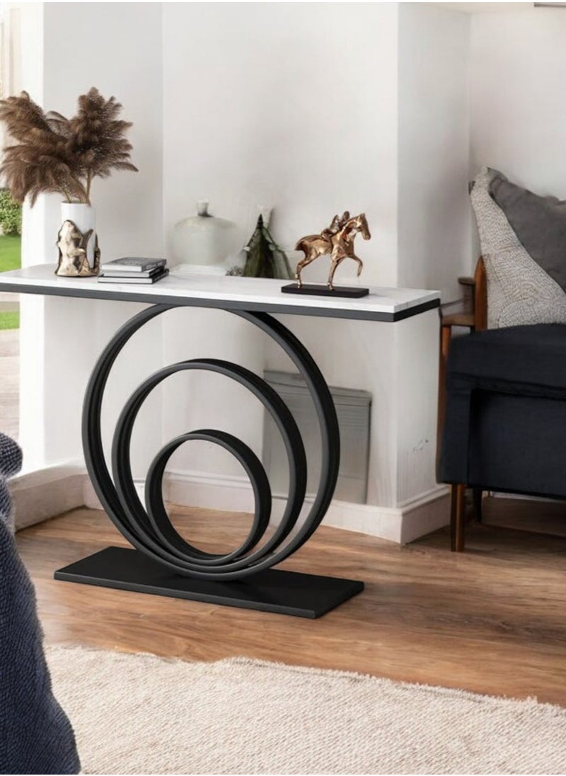 fan baytk - The Black Modern Entryway is a piece of furniture that combines elegance and practicality. With dimensions of 110 cm length x 90 cm height x 30 cm width, this entryway provides ideal storage space for everyday items, and can also be used to display flowers or decorative items, adding a distinctive aesthetic touch to any interior space. Its modern design is in harmony with high-quality materials, making it easy to maintain and ensuring that its attractive appearance is maintained. With a unique visual balance between black iron and marble wood, this entryway is a great attraction that enhances the aesthetics of your home. - Image 1