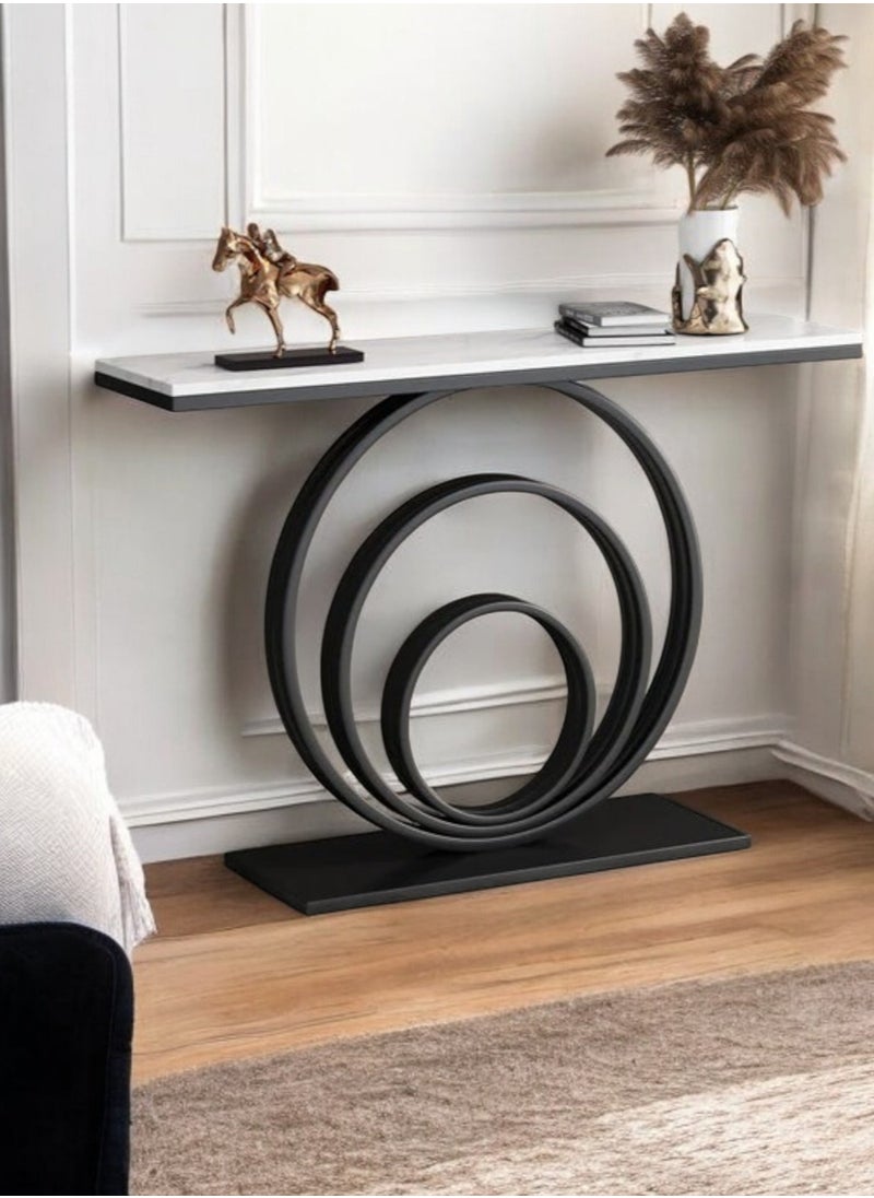 fan baytk - The Black Modern Entryway is a piece of furniture that combines elegance and practicality. With dimensions of 110 cm length x 90 cm height x 30 cm width, this entryway provides ideal storage space for everyday items, and can also be used to display flowers or decorative items, adding a distinctive aesthetic touch to any interior space. Its modern design is in harmony with high-quality materials, making it easy to maintain and ensuring that its attractive appearance is maintained. With a unique visual balance between black iron and marble wood, this entryway is a great attraction that enhances the aesthetics of your home. - Image 1