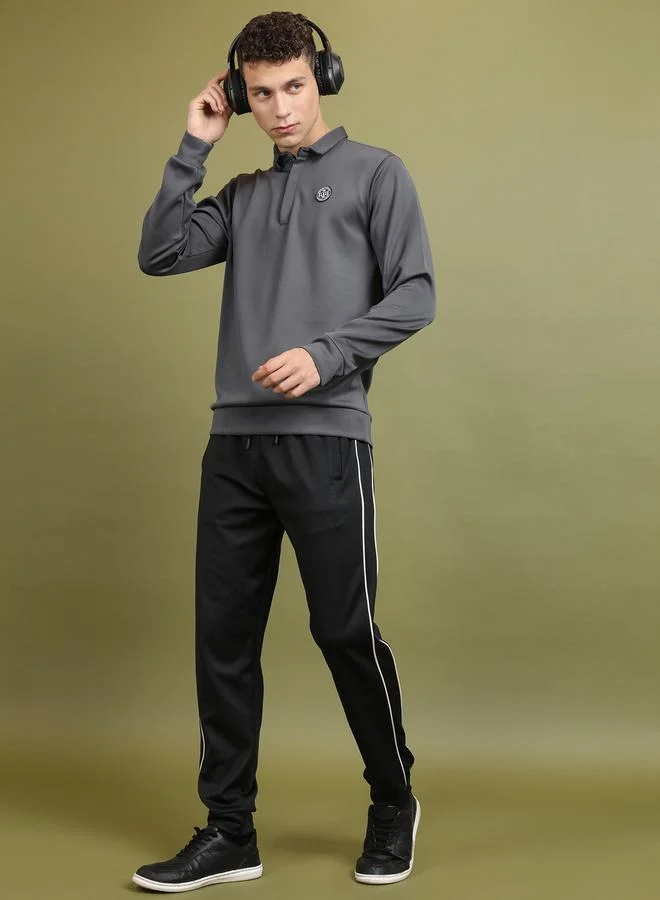 HIGHLANDER Solid Badge Detail Polo Neck Sweatshirt by Styli