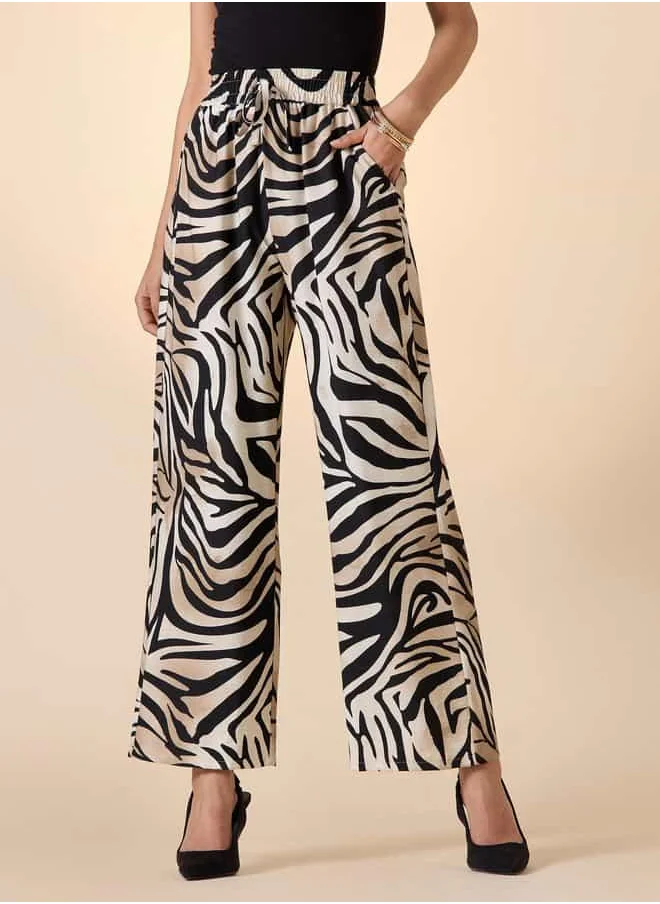 ايكونيك Iconic Relaxed Fit Animal Print Trousers with Drawstring Closure and Pockets