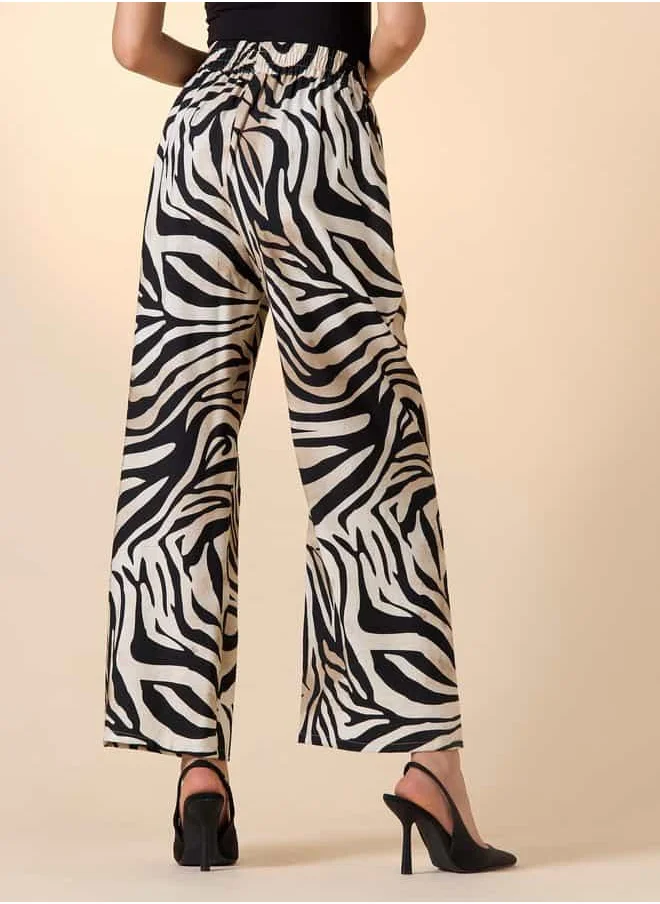 ايكونيك Iconic Relaxed Fit Animal Print Trousers with Drawstring Closure and Pockets