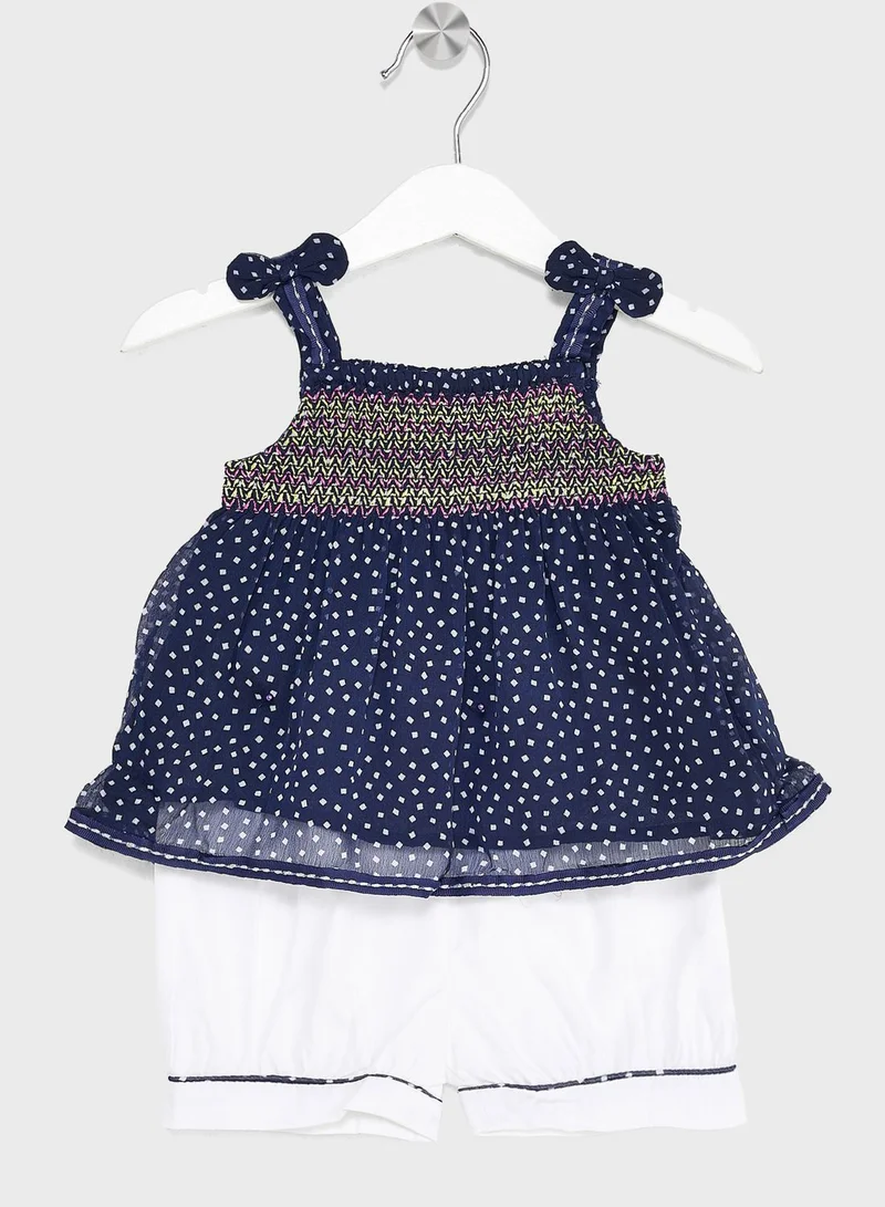 Nautinati Nauti Nati Girls Navy Blue  White Self Design Top With Pure Cotton Shorts