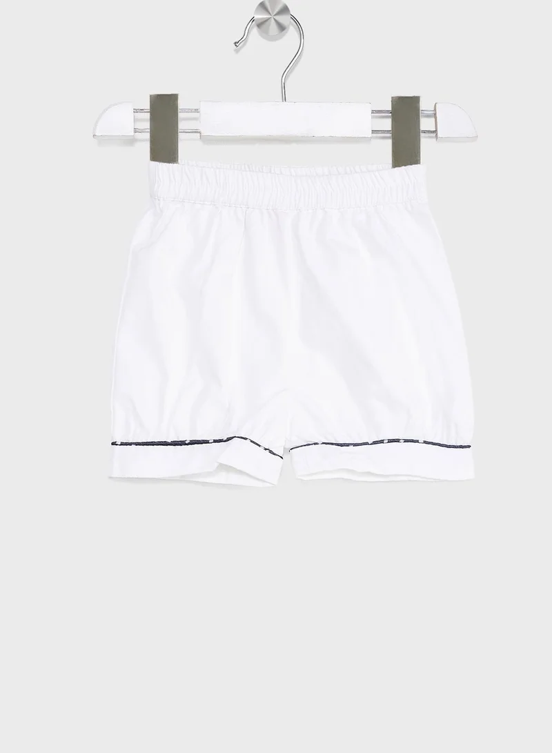 Nautinati Nauti Nati Girls Navy Blue  White Self Design Top With Pure Cotton Shorts