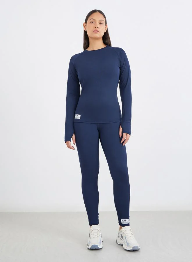 Styli Styli Textured Rib Long Sleeve Top with Badge Detail