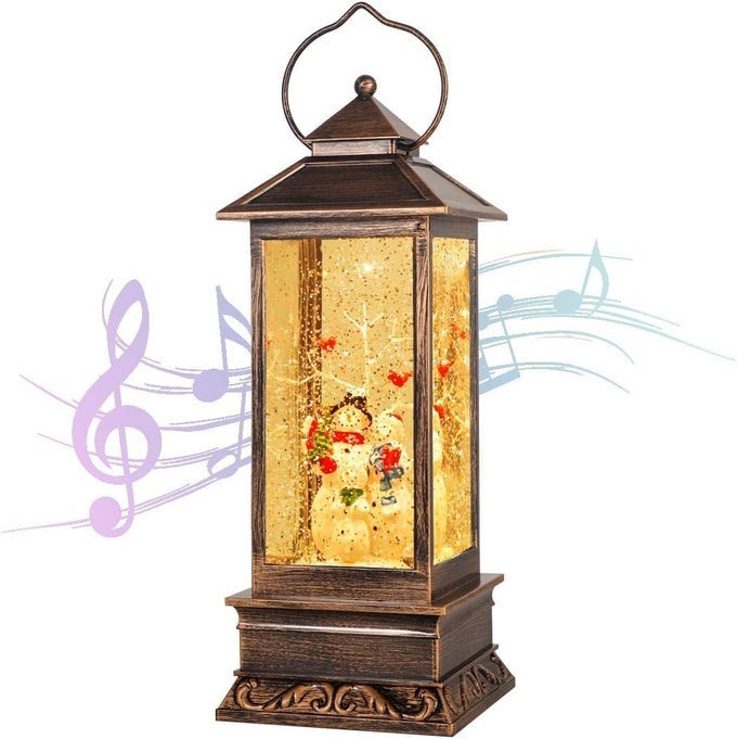 HOUSE GARDEN DECORATIONCHRISTMAS LANTERN WITH 8 PIECES OF MUSICSPARKLING CRYSTAL KEEP CIRCLING AROUND THE SNOWMAN FAMILIES MUSIC BOX AS A CHRISTMAS GIFT SNOWMAN FAMILIES