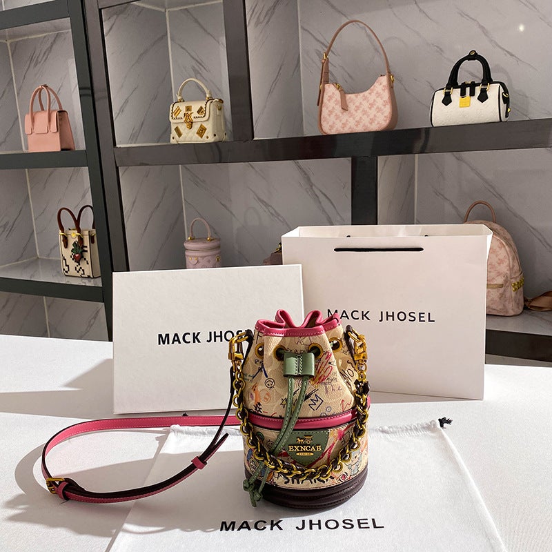 A Generation Of Drawstring Graffiti Bucket Bag 2024 High Sense Of Niche Cylinder Handbag - Image 5
