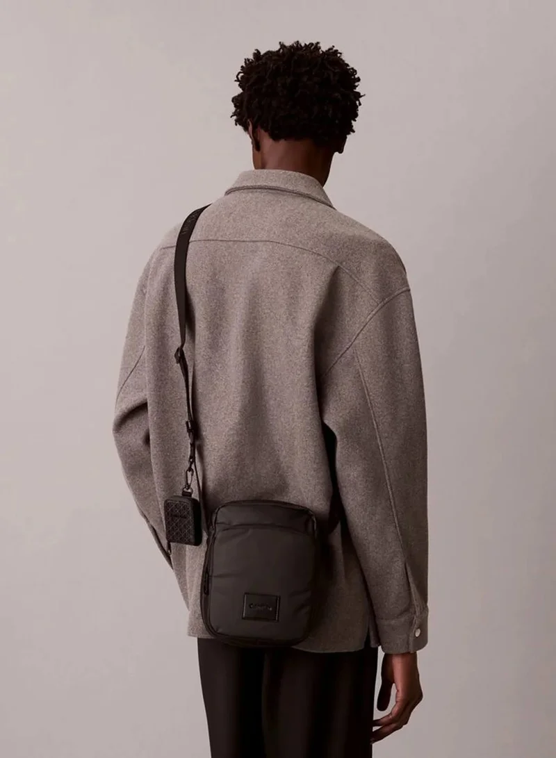 Calvin Klein Black Puffer Utility Reporter Bag for Men | Best Price UAE