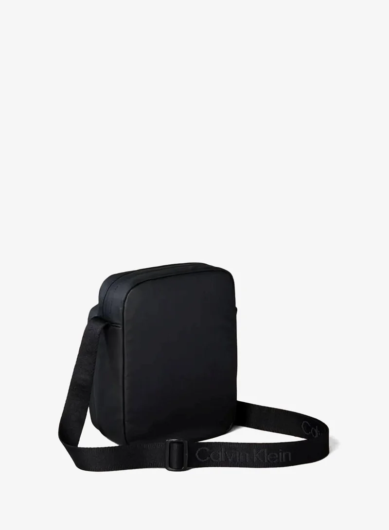 Calvin Klein Black Puffer Utility Reporter Bag for Men | Best Price UAE