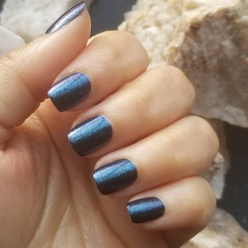 Dazzle Dry Nail Lacquer (Step 3) - Blue Blood - A full coverage galaxy-inspired shimmer that shifts blue, purple and green against a black base. (0.5 fl oz) - Image 3