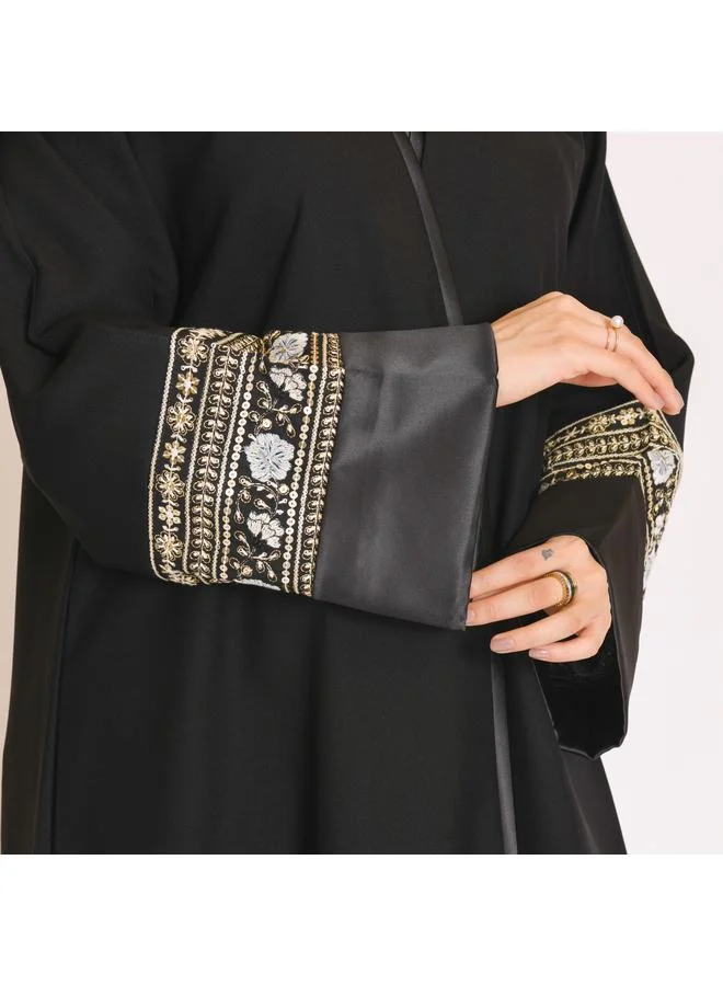 عبايات حوراء عباية لف سوداء بكلفة زاهية على الاكمام الدبل