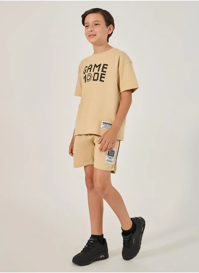 ستايلي Styli Slogan Print Round Neck T-Shirt and Shorts Set