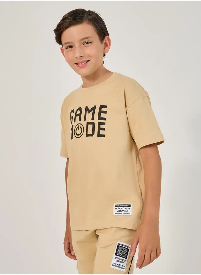 ستايلي Styli Slogan Print Round Neck T-Shirt and Shorts Set