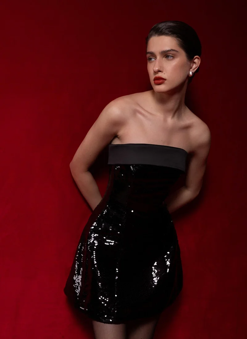 Sequin mini dress with open shoulders