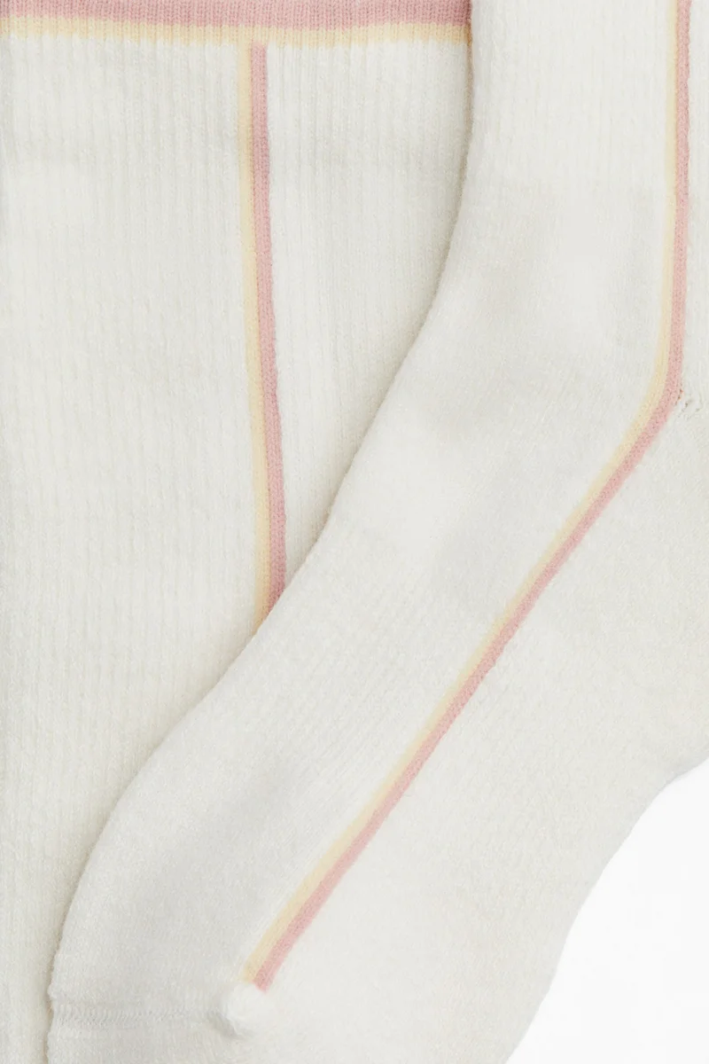 اتش اند ام جوارب تزلج