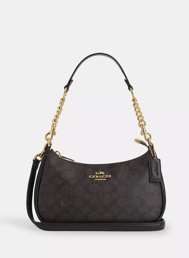 كوتش اوت ليت حقيبة كتف نسائية من Coach Teri مصنوعة من قماش مميز، حقيبة يد نسائية، حقيبة هوبو نسائية، حقيبة توت نسائية، حقيبة سفر نسائية، لون الجوز الأسود 24 سم - Image 1