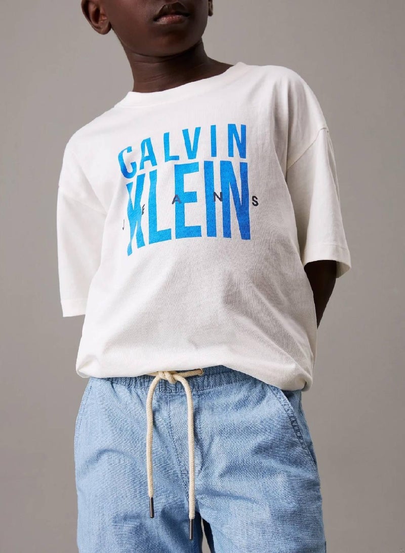 كالفن كلاين جينز بنطال تشينو شامبراي بقصة واسعة - Image 3