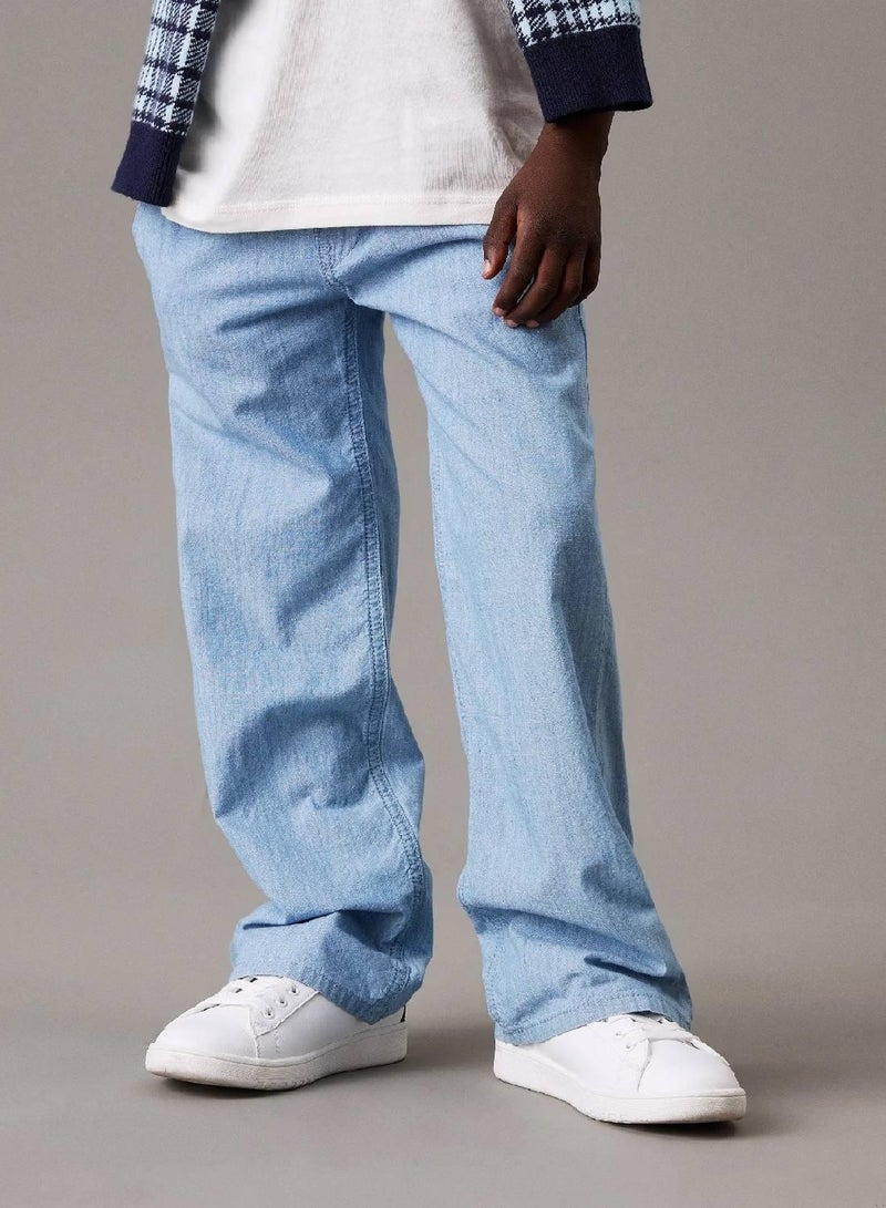 كالفن كلاين جينز بنطال تشينو شامبراي بقصة واسعة - Image 1