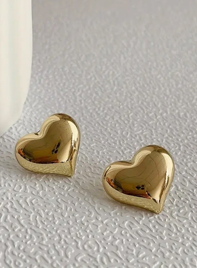 Ready For Chai Minimalist Silvery Needle Earrings With A Heart-shaped Design, Perfect For Women Who Appreciate Unique And High-quality Ear Accessories. - Image 1