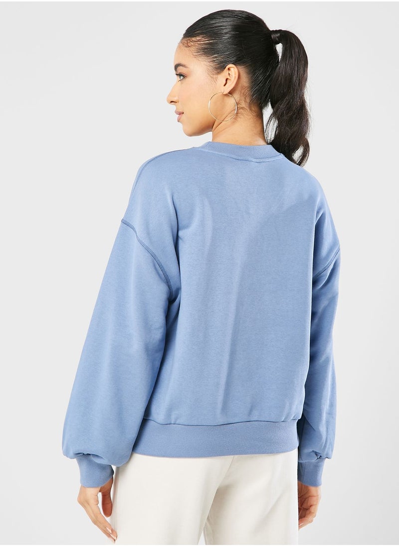 New Balance - Essentials Graphic Terry Sweatshirt - Image 1