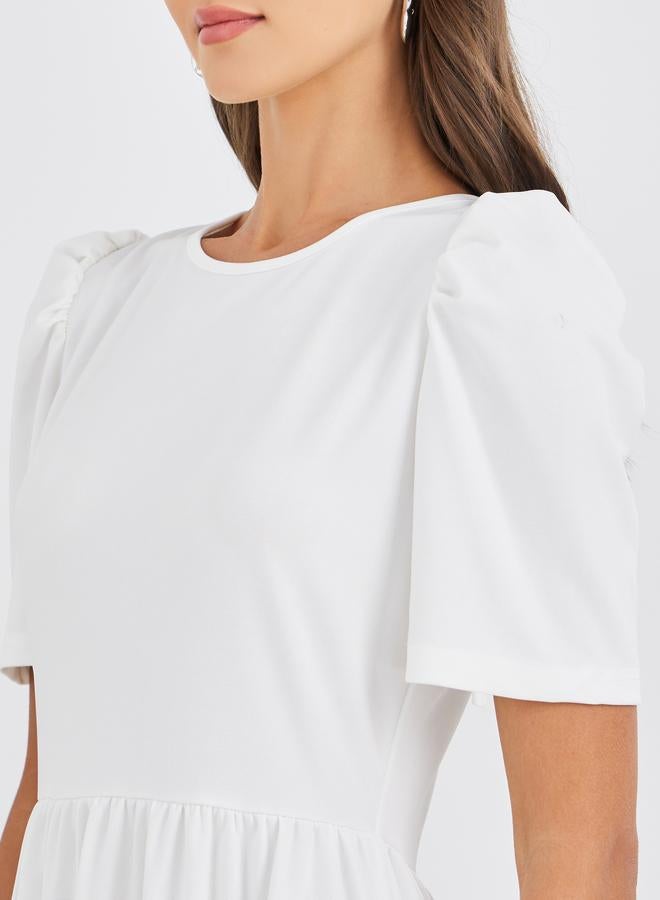 ستايلي فستان ماكسي بأكمام منفوشة صلبة وخصر مجمع - Image 4