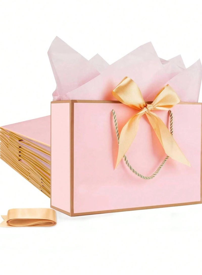 2 kraft paper gift bags with gold twisted rope handles and a pink silk satin ribbon to close the bag. Perfect for giving thoughtful gifts for weddings and bachelorette parties. - Image 5
