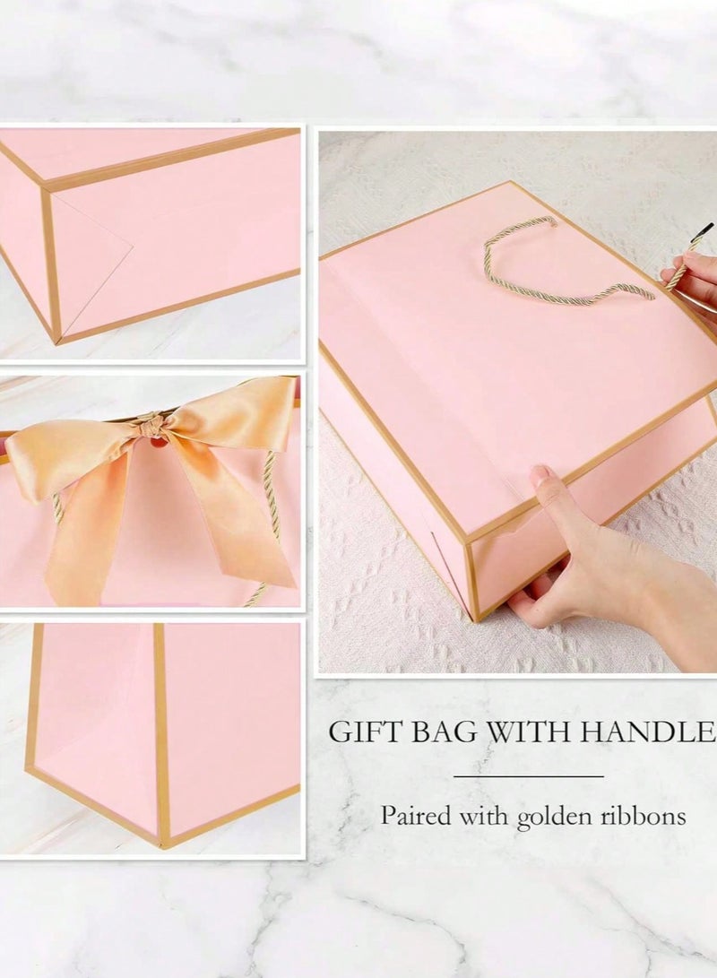 2 kraft paper gift bags with gold twisted rope handles and a pink silk satin ribbon to close the bag. Perfect for giving thoughtful gifts for weddings and bachelorette parties. - Image 1