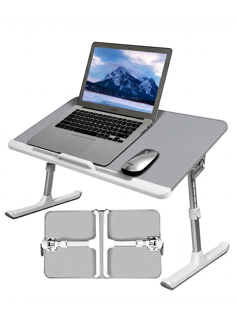 Foldable laptop table - adjustable height and tilt angle, 60*40 cm surface, with non-slip feet, suitable for (work, study, eating) and stores with a touch - Image 1