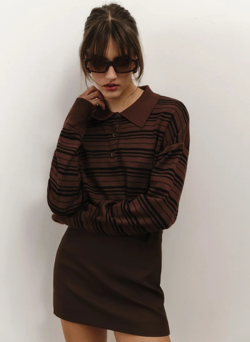 ليتشي قميص بولو مخطط محبوك بأكمام طويلة