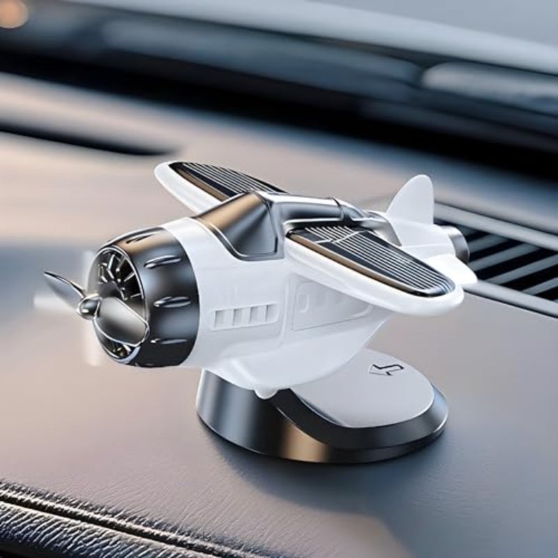 JIAYOSEE A Solar-Powered Car Ornament Light-activated spinning Rotates as car moves - Image 1