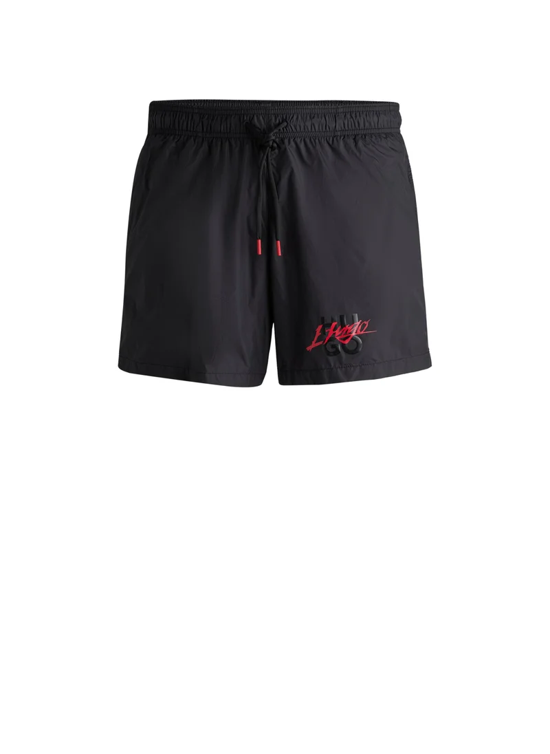 هوجو Fully lined swim shorts with stacked logo