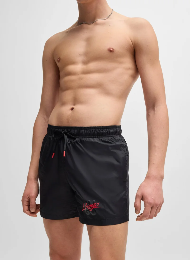 هوجو Fully lined swim shorts with stacked logo