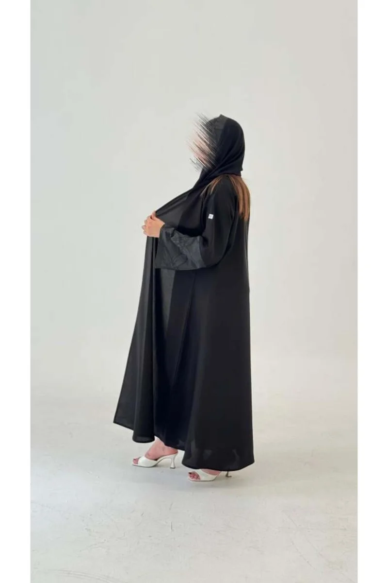 توري للعبايات عباية كتان مع اكمام جاكارا واسعه