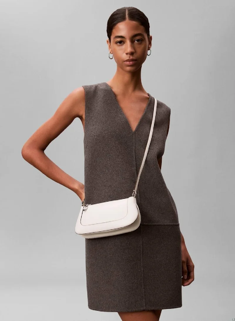 CALVIN KLEIN Lily White Engraved Long Zip Crossbody Bag for Women | Best Price UAE
