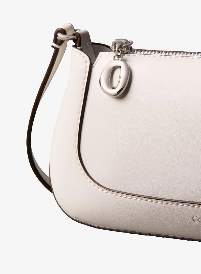 CALVIN KLEIN Lily White Engraved Long Zip Crossbody Bag for Women | Best Price UAE