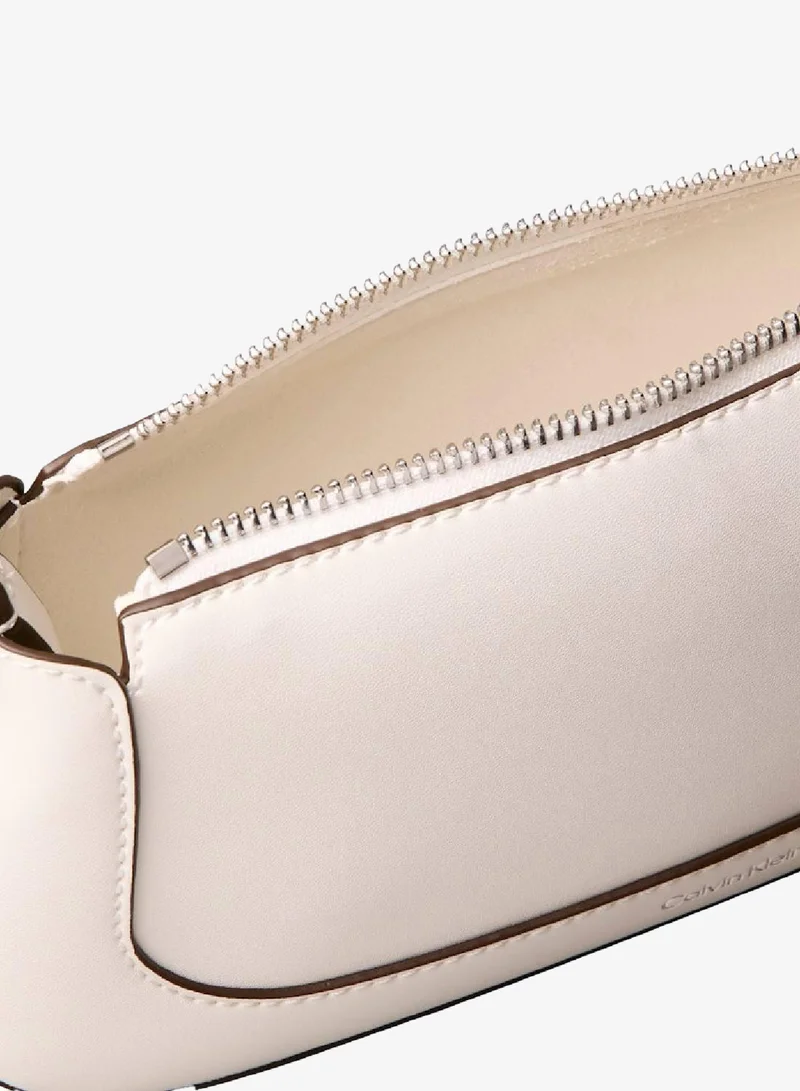 CALVIN KLEIN Lily White Engraved Long Zip Crossbody Bag for Women | Best Price UAE