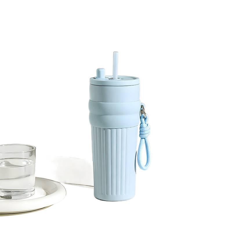 قارورة مياه معزولة، ستانلس ستيل وغطاء بشفاط، 860 ml، أخضر مع غطاء بقشة من الستانلس ستيل باللون الأخضر أثناء التنقل للطاولة للمكتب - Image 5